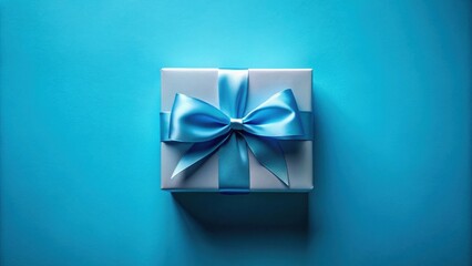 Wall Mural - A light-grey gift box with a vibrant blue ribbon bow, presented on a bright blue background