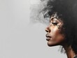 © Nana - A profile portrait of a woman with natural hair, showcasing beauty and elegance.