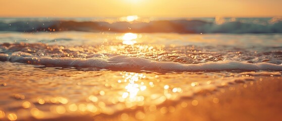Wall Mural - serene close-up gentle sea wave lapping onto sunlit sandy beach background