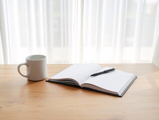 a wooden desk with a white mug, a notebook, a pen. the notebook is open and the pen is resting on to