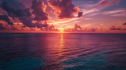 Wall Mural - mesmerizing golden sky reflecting across vibrant turquoise waters in the maldives, creating a serene