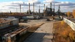 © WS Studio 1985 - Industrial Plant with Metal Structures and Equipment Under Clear Sky