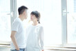 © 亮亮 徐 - Young couple cuddling each other in the university study room