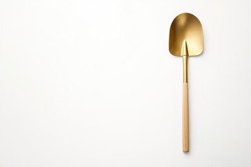 Poster - small gold shovel displayed against clean white background for minimalist and functional look