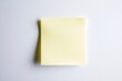 © Maria - sticky note in soft yellow shade perfectly square and flat displayed on bright white background