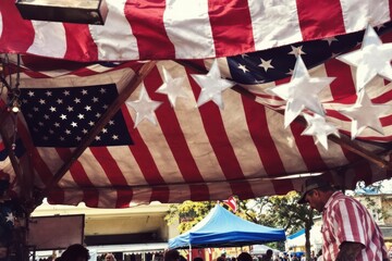 Canopy adorned with the American flag at a rural fair