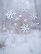 © Brittany - Snowflakes on a windowpane with frost patterns