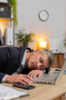 © Andrii Iemelianenko - Bored sleepy businessman working on laptop computer leaning on hand sleeps at home office desk. Tired exhausted Caucasian man freelancer workaholic guy falling asleep. Employment, occupation, workless