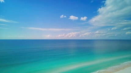 Poster - A scenic view of the ocean from the top of a hill, ideal for use in travel or nature-related projects