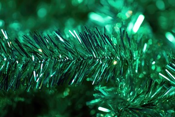 Poster - A close-up shot of a festive green Christmas tree with ornaments and lights