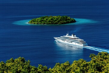 Aufkleber - A large white boat sailing across the surface of the water, ideal for use in travel or adventure-related contexts