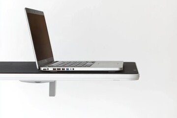 Poster - a laptop computer placed on a desk