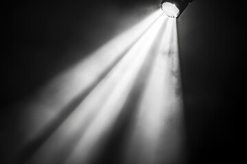 Poster - A black and white photo of a light beam
