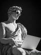 © sponge_Po - Classic statue wearing sunglasses while using a laptop in a modern context