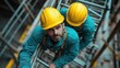 © Vadym - Two construction workers in safety gear, hard hats climb metal ladder. Focused on task. Construction site background with metal framework visible. Teamwork, dedication to building infrastructure