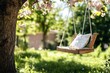 © Lens Legacy - Wooden swing beneath blooming tree offers a tranquil escape in a sunlit garden