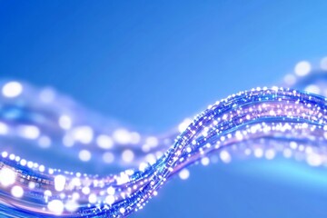 Poster - Abstract wave of light with shimmering particles on a blue background.