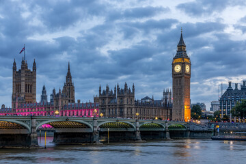 houses of parliament city and Big Ben Illuminated at night.