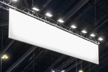 Poster - Mock up a large brand sign hanging from the ceiling to display an exhibition. Mock up a large brand sign to convey the brand.