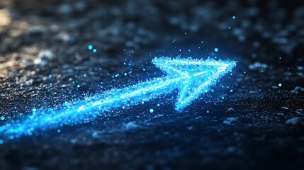 Wall Mural - a glowing blue arrow made of sparkles, suggesting direction and movement.