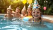 © armaya - Happy children celebrate birthday pool party.