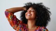 © WS Studio 1985 - Happy Young Woman Smiling Playfully with Curly Hair and Bright Outfit