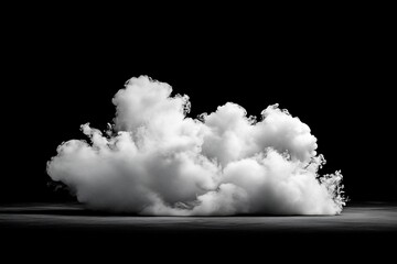 Poster - Monochrome image of a fluffy white cloud formation against a black background.