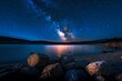 © SnapScape - Starry sky above a serene lake with rocks