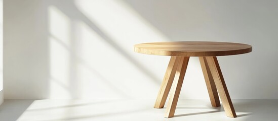 Poster - Elegant minimalist round wooden table highlighting versatility against a clean white backdrop with soft natural lighting shadows