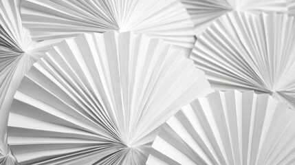 Poster - Textured white origami fans showcasing intricate geometric layers for a modern minimalist artistic background or design element.