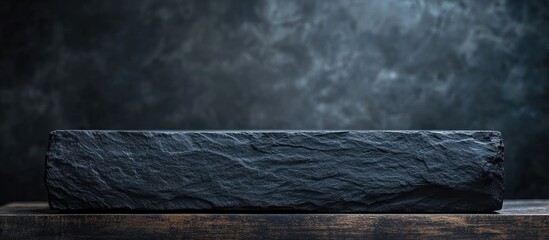 Poster - elegant dark wooden table with rich textures set against a softly blurred abstract backdrop ideal fo
