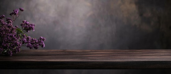 Poster - dark wooden tabletop with rich textures and blurred abstract background ideal for product showcases 
