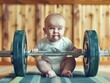 © Daria - Humorous image of a strong baby exerting effort to lift a heavy barbell with gusto