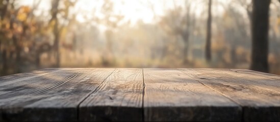 Poster - Rustic wooden table surface with soft focus background perfect for interior design and natural aesthetic projects showcasing warm textures.