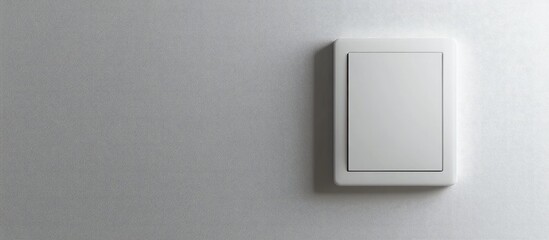 Poster - Minimalist light switch on a pristine white wall perfect for modern interior design concepts and home renovation projects.