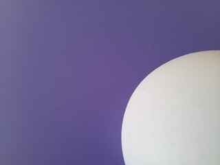 white ball on a blue background