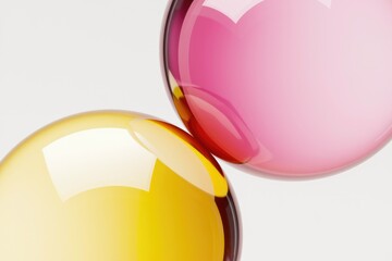Poster - Two glossy spheres, one pink and one yellow-gold, rest gently on a white background.