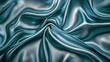 © Gaming - Textured teal and silver satin fabric draped in soft folds.