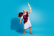 © deagreez - Photo of antique olympian god wearing traditional toga throw lightning bolt isolated on blue color background