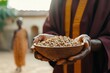 © LifeMedia - Holding a bowl of grains under the warm sun in a vibrant outdoor setting