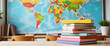 Colorful textbooks stacked in classroom with world map, educational inspiration