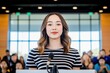 © Centric  - Asian businesswoman is giving a speech at a business conference, standing at a lectern in front of an audience
