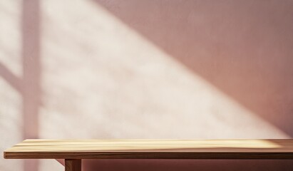 Poster - Empty wooden table against a pink wall with sunlight.