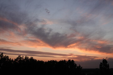 Wall Mural - Rose sunset and colorful clouds