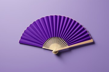 purple fan with a gold band on a purple background