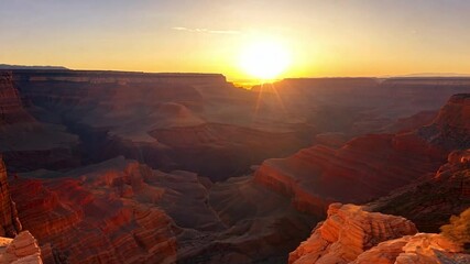 Poster - This stunning sunset casts colorful reflections across the Grand Canyon's cliffs and valleys.
