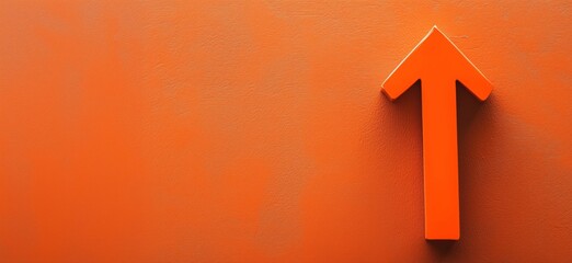 Poster - Orange arrow pointing upwards on textured orange background, symbolizing growth, progress, and direction, copy space for text