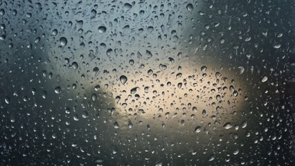 Wall Mural - closeup view capturing the intricate condensation of fog on a window glass surface, showcasing the d