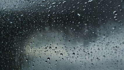 Wall Mural - closeup view capturing the intricate condensation of fog on a window glass surface, showcasing the d