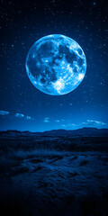 Wall Mural - Large blue moon over a dark landscape at night.